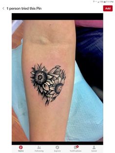 a sunflower heart tattoo on the right arm and leg, with flowers in the middle