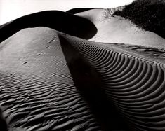 the lines in the sand are shaped like waves