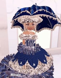 a woman in a blue dress holding an umbrella