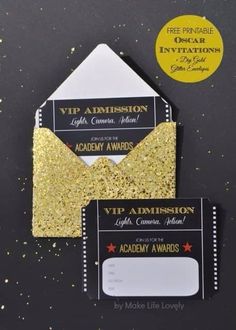 two gold glitter envelopes with black and white labels on them, one has a red star