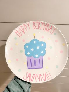 a birthday plate with a cupcake on it and the words happy birthday savannah written in pink