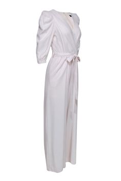 Go cottagecore couture with this darling jumpsuit from BCBG! Made with precious puff sleeves in a trendy wide leg silhouette, this belted beauty is perfect for a springtime brunch or a romantic picnic in the park. Style with wedges and a straw bag and you'll be enjoying mimosas in the sunshine in no time! Size XXS Shell: 97% Rayon, 3% Polyester Lining: 88% Polyester, 12% Spandex Concealed back zipper Lined Wide leg silhouette Surplice neckline Quarter puff sleeves Open pockets on sides of waist Romantic Picnic, French Fashion Designers, Bcbg Max Azria, Sweater Trends, Picnic In The Park, Max Azria, Buy Shoes Online, French Fashion, The Sunshine