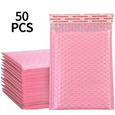 50 pink bubble bags with white dots on the bottom and one bag in the middle