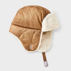 Keep your little one cozy all winter with this Suede Faux-Fur Trapper Hat from Cat & Jack™. This trapper hat is crafted from heavyweight fabric with faux fur and full lining, complete with functional ear flaps to keep the warmth in and the cold out. Plus, it features a chinstrap hook-and-loop fastener for a snug, stay-put fit. Cat & Jack™: Designed for all children so you can trust it's made for yours. Fur Trapper Hat, Fur Trapper, Trapper Hat, Trapper Hats, Recycled Polyester Fabric, Toddler Boy Outfits, Hat Shop, Baby Hats, Toddler Outfits