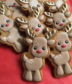 cookies decorated like reindeers are on a table