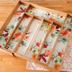 an empty tray with floral designs on it