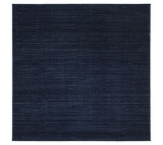 a dark blue rug is shown on a white background, with no one in it