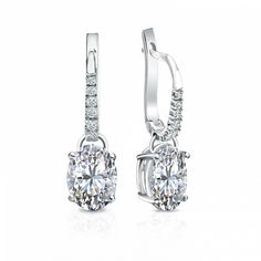 These exquisite diamond earrings come set in 18k white gold metal dangle studs 4-prong basket setting and breathtaking oval-cut natural diamonds with 2.00 ct. total weight for center stone and 0.10 ct. total weight of small dazzling round diamonds as side stone, together takes 2.10 ct. total weight, available with lever back clasps. Black Diamond Pendant, Black Diamond Studs, Halo Diamond Earrings, Solitaire Diamond Pendant, Colored Diamond Rings, Platinum Earrings, Black Diamond Ring, Earrings Dainty, Diamond Drop Earrings