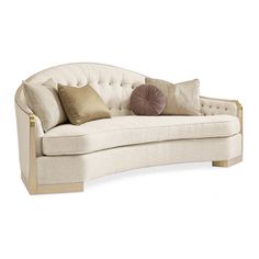 a white couch with pillows on it and a pillow in the back ground, against a white background