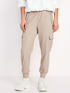 elastic waistband zippered hip pockets flap-cargo pockets at thigh go-dry wicks moisture breathable sits at belly button relaxed thigh 27" regular inseam 25" petite inseam 30" tall inseam models are approx.  5'9" and wear sizes s (4), l (12), and xl (18)machine wash according to the care instruction label  . Best Holiday gift for Women , perfect Joggers for Christmas! Cargo Joggers, Family Maternity, Family Pajamas, Old Navy Women, Big And Tall, Petite Size, Wicks, Belly Button, Toddler Boys