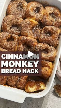 cinnamon monkey bread in a white baking dish with the words cinnamon monkey bread hack on top