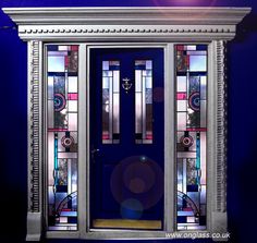 a blue door with stained glass panels on the front and side doors, in an art deco style