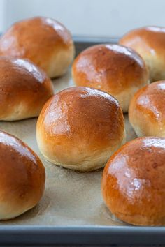 freshly baked rolls on a baking sheet ready to go into the oven