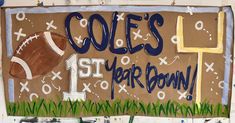 a sign painted on the side of a building that says cole's 1st year down