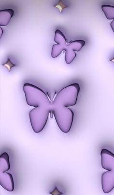 several purple butterflies flying in the air with gold stars on it's backs and sides