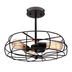 an industrial style ceiling light with three bulbs in the center and wire cage around it