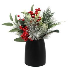 a black vase filled with red berries and greenery on top of a white background