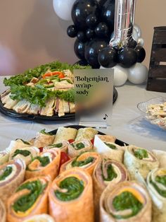 an assortment of food on display at a party