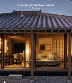 an image of a house that is lit up at night with the words hoshinyo taketomi island on it