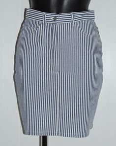 Vintage blue striped skirt MISS DYNAM Size 36 FR In very good condition Size on the label : 38 FR but fits small like a 36 FR (waist: 34 cm).  Composition: cotton 100% Colour: blue and white Length: 47 cm Striped Lined Skirt For Workwear, Striped Lined Skirt Bottoms For Workwear, Fitted Striped Skirt, High Waist Striped Fitted Skirt, Fitted Striped Mini Skirt With Lining, Spring Mini Skirt With Vertical Stripes, Striped Mini Skirt With Lining, Fitted Striped Pencil Skirt, Casual Striped Mini Skirt For Work