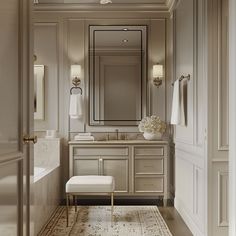 an elegant bathroom with white and gold decor