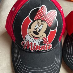 Disney Minnie Mouse Baseball Cap With Velcro Adjustable Back. New With Tags Adjustable Minnie Mouse Cap, Black Mickey Mouse Cap, Casual Black Mickey Mouse Hat, Adjustable Black Minnie Mouse Hat, Black Adjustable Minnie Mouse Hat, Cute Adjustable Black Baseball Cap, Red Mickey Mouse Adjustable Hat, Adjustable Red Mickey Mouse Hat, Fun Mickey Mouse Themed Hat One Size Fits Most