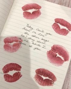 a notebook with lipstick imprints on it and the words, they can't you take