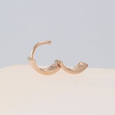 14K 8 mm Solid Gold Huggie Hinged Hoop Earrings, Huggie Hoops, Gold Huggies, Small Gold Hoops, Cartilage, Conch, Helix, Tragus, EF2142-1 Please note that this earring is made to order. S P E C S ♦ All of our jewelry is handmade in our studio in Seoul, Korea. ♦ 14K Yellow Gold ♦ Listing is for 1 Earring ♦ If you want a pair, choose 2 at Quantity section ♦ Huggie Dimensions: - outer diameter approximately 8.2 mm - inner diameter approximately 6.3 mm - hoop thickness 5.5 mm - post thickness 0.8 mm Rose Gold Small Hoop Huggie Earring (single), Internally Threaded Small 14k Gold Hoop Earrings, Small 14k Gold Internally Threaded Hoop Earrings, Rose Gold Internally Threaded Huggie Cartilage Earrings, Rose Gold Small Hoop Huggie Earrings, 14k Gold Internally Threaded Huggie Earrings, Rose Gold Small Hoop Cartilage Earrings, Adjustable Huggie Cartilage Earring, Adjustable Single Huggie Cartilage Earring