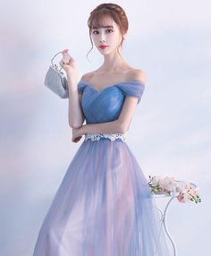 Blue Tulle Dress For Prom Season, Light Blue Tulle Dress For Banquet, Light Blue Tulle Dress For Evening, Light Blue Tulle Party Dress, Blue Tulle Bridesmaid Dress For Prom Season, Blue Tulle Bridesmaid Dress For Prom, Blue Tulle Skirt Dress For Debutante Ball, Blue Tulle Gown With Tulle Skirt, Light Blue Tulle Dress For Prom Season