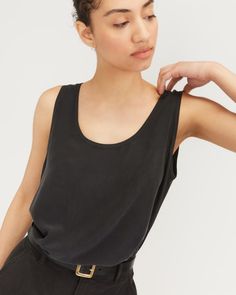 The Clean Silk Scoop-Neck Tank Black – Everlane Chic Solid Color Tank Top With Scoop Back, Chic Solid Color Tops With Scoop Back, Chic Solid Tops With Scoop Back, Sleek Solid Color Scoop Neck Top, Sleek Tops With Scoop Neck And Minimal Stretch, Sleek Scoop Neck Tops With Minimal Stretch, Sleek Top With Scoop Neck And Minimal Stretch, Sleek Scoop Neck Tank Top With Minimal Stretch, Chic Everyday Tops With Scoop Back