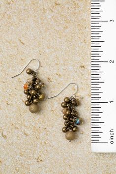 An aesthetically pleasing pair of earrings made from abalone and Czech glass, completed with sterling silver ear wires. These fun cluster earring are handcrafted with Czech glass and ideal for pairing with other items from the Dunes Collection. Sterling Silver (lead and nickel free) Czech Glass 1.5", with sterling silver ear wires We hand select our natural materials, thus there may be slight variations in color and/or size that will not detract from the overall aesthetic Our unique handcrafted Iridescent Czech Glass Dangle Earrings, Iridescent Dangle Earrings Nickel Free, Iridescent Nickel-free Dangle Earrings, Iridescent Dangle Beaded Earrings With Ear Wire, Czech Glass Dangle Earrings With French Hook, Floyd Va, Cluster Earring, The Dunes, Cluster Earrings