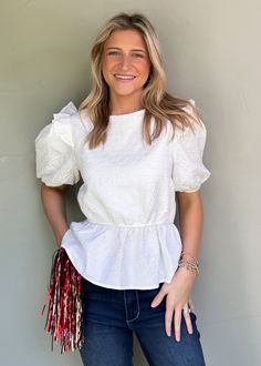 Be effortlessly stylish all year round with our Audrey Puff Sleeve Top! The textured print adds a playful touch and the ruffle details make it girly and flirty. With puff sleeves and available in two colors, wear it to work, play, or game day! True to Size Olivia is 5'6 wearing small Color: White Puff sleeves with ruffle detail Round neckline Textured print Not Lined Pull on fit Fabric: 100% Polyester Floral Dress Casual, Black Short Dress, Puff Sleeve Top, Dress With Cardigan, Dressy Casual, Floral Dress Black, Casual Blouse, Headband Hairstyles, Dress Romper