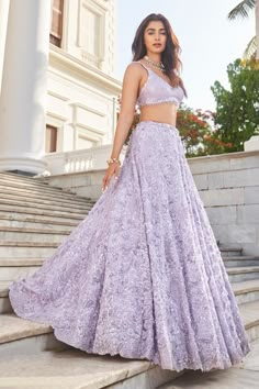 Purple lehenga featuring all-over tonal sequin floral embroidery and cutwork detail on the hem. Paired with an embroidered sleeveless padded blouse and a dupatta with floral embroidered cutwork border and fringe detailing., Fit: Relaxed Mauve Lehenga, Floral Bridal Lehenga, Lavender Lehenga, Sequin Lehenga, Seema Gujral, Purple Lehenga, Chic Prom Dresses, Neo Pop, Sangeet Outfit