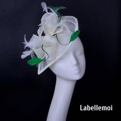 New elegant design! Sinamay teardrop base with sinamay ribbons and feathers satin covered 13mm headband at the back to attach to head Ideal for wedding/party/races/church It is handmade product and every hat is well inspected before shipment,no return accepted.But please do contact us if you have any problems on your order.Thanks for your supports. Cream Feathered Mini Hat For Weddings, Green Mini Hat With Feathers For Wedding, Green Feathered Mini Hat For Wedding, White Luxury Fascinator For Kentucky Derby, White Adjustable Fascinator For Races, Luxury White Formal Fascinator, Green Headband Fascinator For Royal Ascot, Green Feathered Headpiece For Weddings, Luxury Green Fascinator For Races