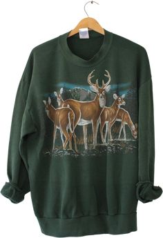 Deer Stag Wilderness SweatshirtCondition: worn in, pilling insideTag reads:Jerzees50% cotton50% polyesterXL ( can run small, check measurements below)Made in USAMeasurements:Length (shoulder to end of garment): 26. 5"Width (armpit to armpit): 24"Sleeve (armpit to end of sleeve): 19" Thrifty Clothes, Lazy Clothes, Thrift List, Western Fits, Fashion Vibes, Deer Stags, Vintage Deer, Granola Girl, Pin Hole