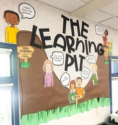 a classroom wall with the words learning pit written on it and cartoon characters around it