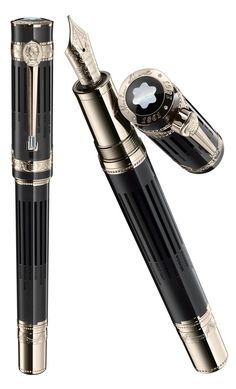 a black and gold pen with an apple logo on the top is next to it