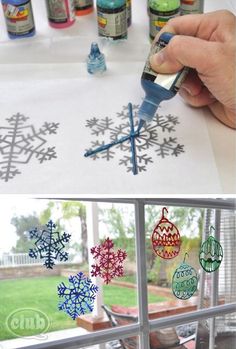 someone is painting snowflakes on the window sill and then they paint them