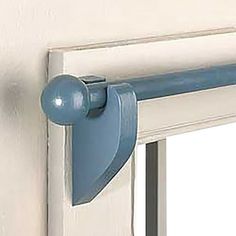 an open window with a blue handle on it