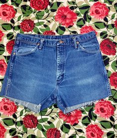 "Amazing vintage 70s Wranglers high waist cut off shorts! Bootylicious😁 Three front inner pockets, two classic back pockets with leather wrangler patch on right side, closes with a bronze metal Wrangler button and Orange top stitching. Made in USA Label: Wrangler Material: 100% Cotton Waist: 36\" Rise: 12.5\" Hip: 40\" Length from waist to cuff: 15\" Shorts have been cleaned, steamed and are ready to wear! Have you found your ✨Vintage Vibe?✨ 💕All sales are final💕 Returns are not accepted unless Vibe Vintage has completely misrepresented an article of clothing. Please message me with any questions🙏🏻" Vibe Vintage, Wrangler Vintage, Orange Top, Bronze Metal, Medium Wash Jeans, Vintage Vibe, Cut Off Shorts, Vintage Vibes, Top Stitching