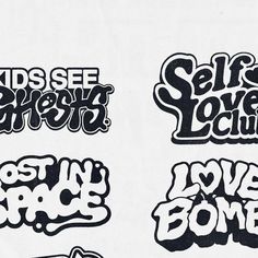 some type of stickers that are on a white paper sheet with black and white lettering