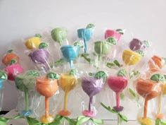 there are many candy lollipops wrapped in cellophane