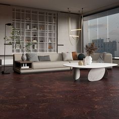 a living room with a couch, table and shelves on the wall next to it