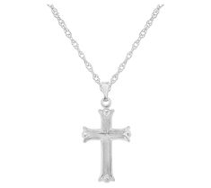 Display your faith beautifully with the elegant craftsmanship of this sterling silver cross pendant. Classic Polished Crucifix Cross Necklace, Classic Silver Crucifix Necklace, Silver Cross Pendant Necklace With Sterling Silver Clasp, Elegant Sterling Silver Crucifix Necklace, White Cross Necklace With Medium-length Chain, Classic White Gold Crucifix Necklace, White Gold Polished Cross Necklace, Silver Crucifix Necklace With Polished Finish, Classic Silver Cross Pendant Necklace