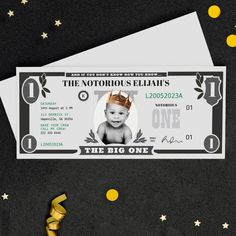 a baby's first birthday party ticket with gold confetti and streamers