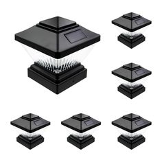 six different angles of a solar powered light on top of black bases with white spikes