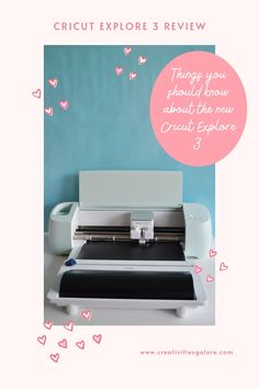 the cricut explore 3 review is shown in front of a blue background with hearts