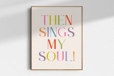 a poster with the words, then sings my soul in multicolored letters on it