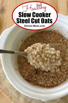 a bowl of slow cooker steel cut oats is shown with a spoon in it