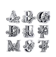 the alphabet is shown with diamonds and other decorative items on it's front page